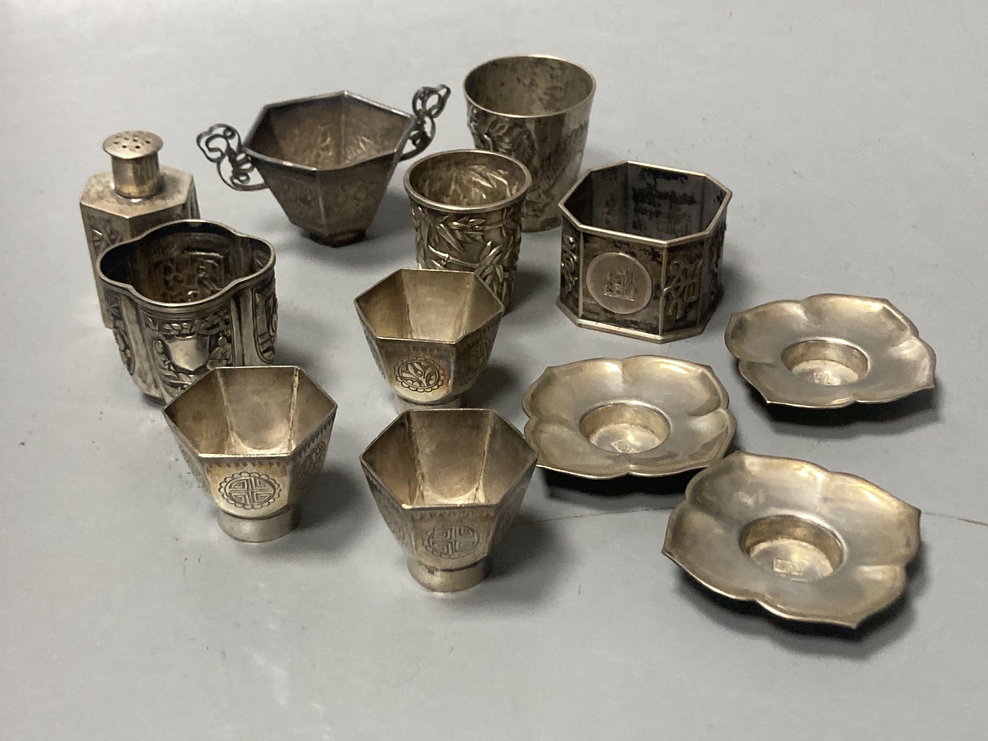Two Chinese white metal tots, one by Wang Hing and seven other Chinese items including white metal napkin ring etc.